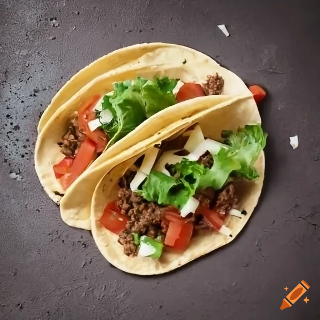 delicious ground beef tacos with lettuce, tomatoes, and cheese