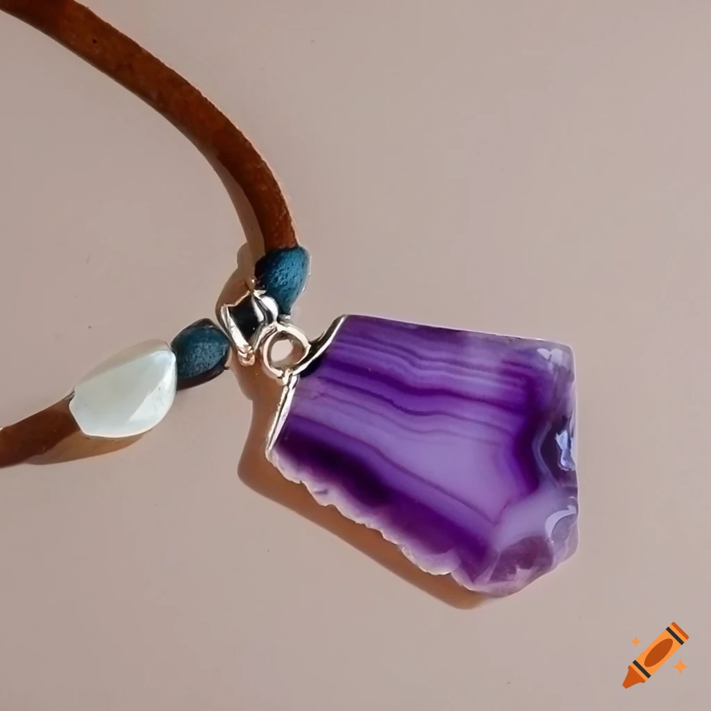 three agate gemstone pendants on leather necklace