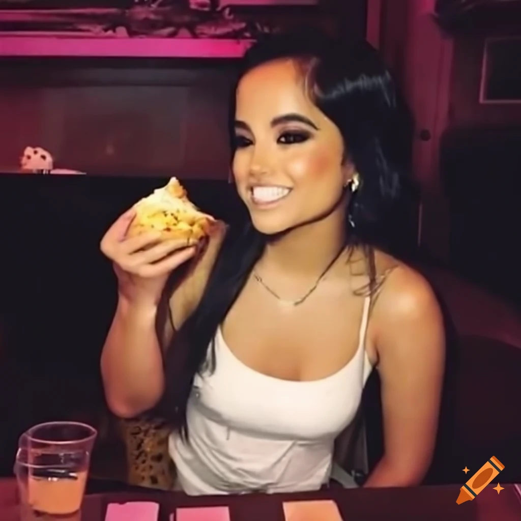 Becky G enjoying queso