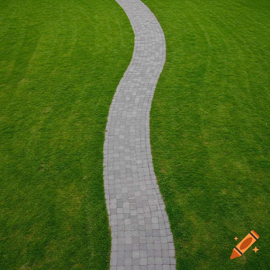 A winding grey paver path curves through a lush green grass lawn.
