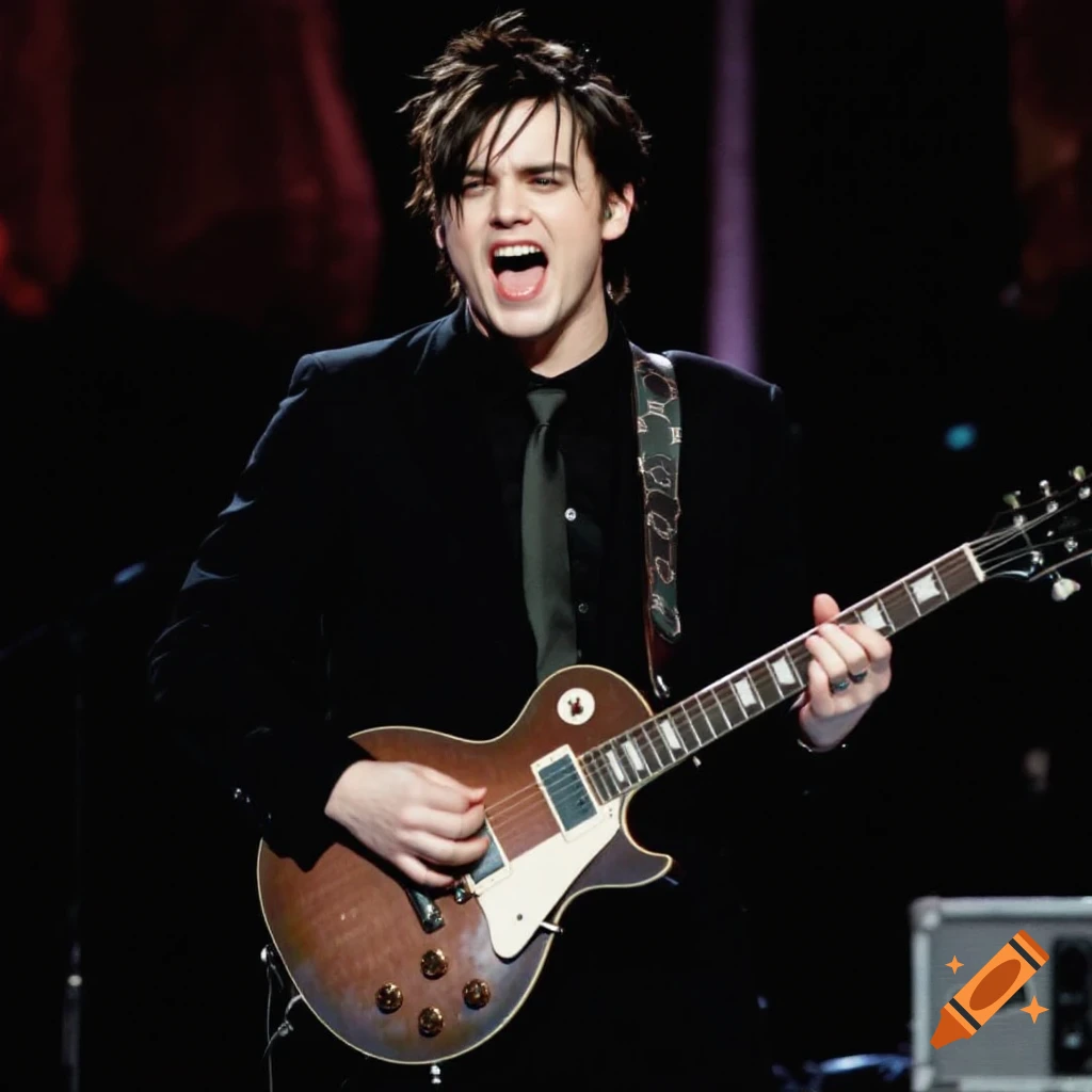 Musician playing a guitar and singing on stage