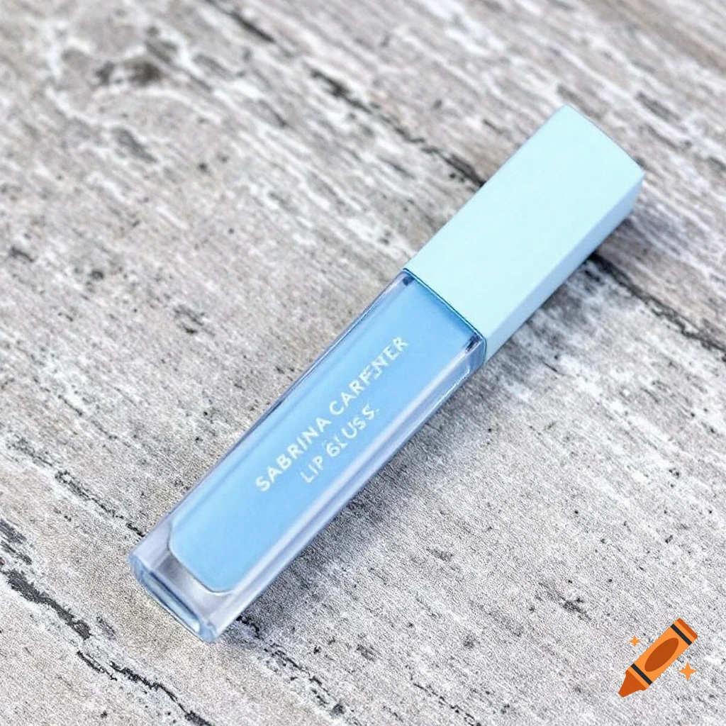 A light blue lip gloss tube lies on a gray textured surface.