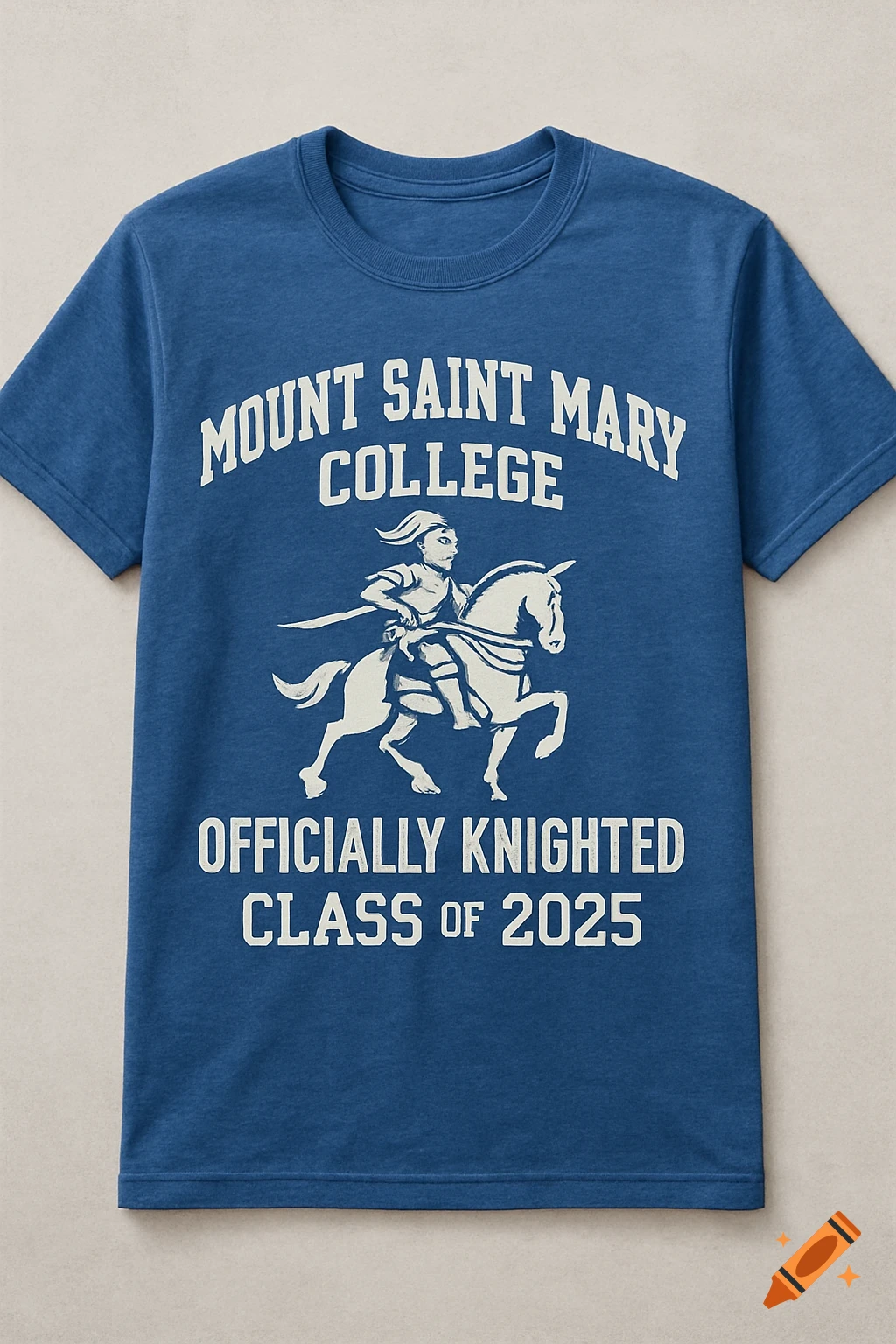 A blue t-shirt with white text 'Mount Saint Mary College Officially Knighted Class of 2025' and an illustration of a person on a horse.