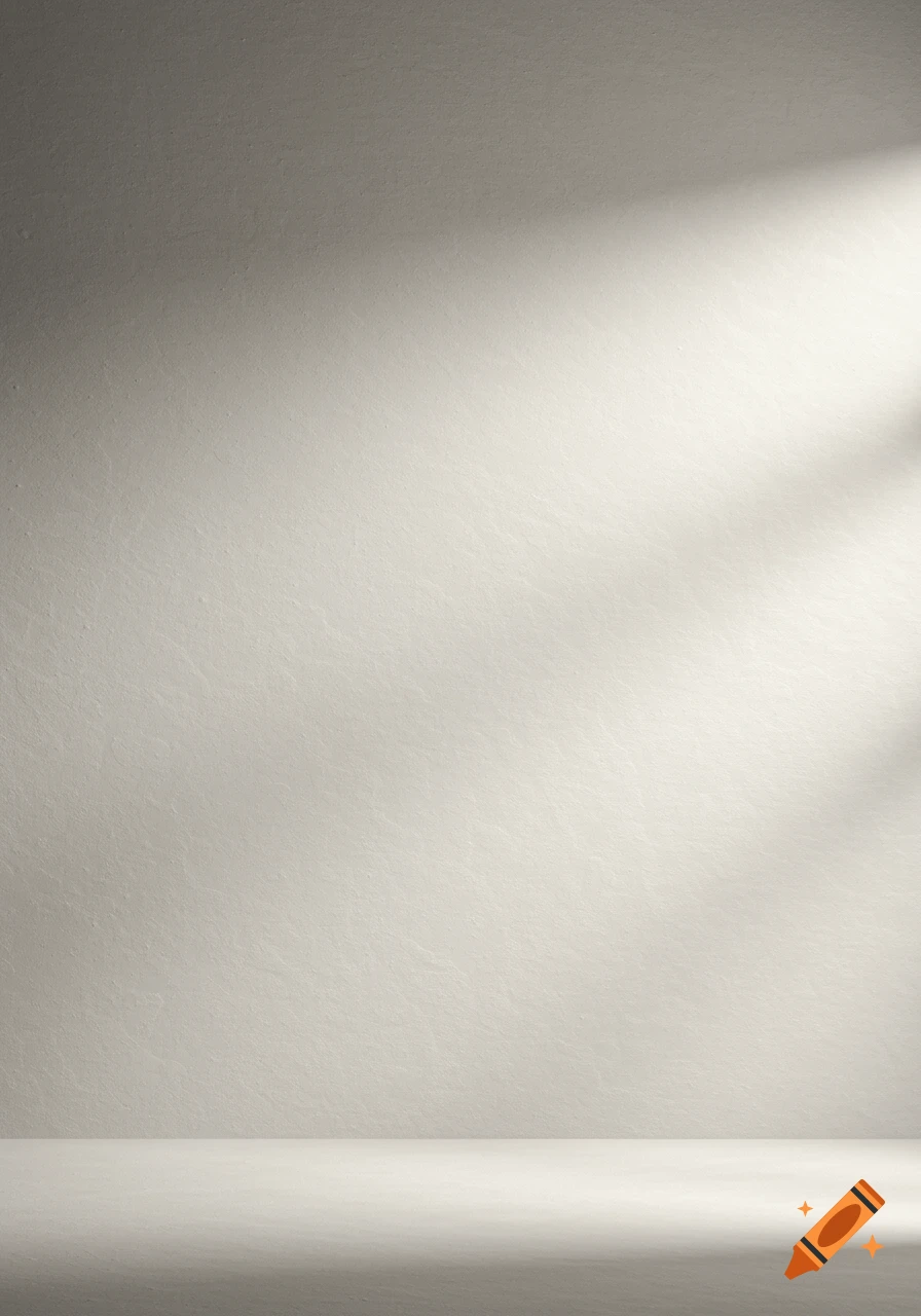 A textured white wall with shadows cast on the right side.