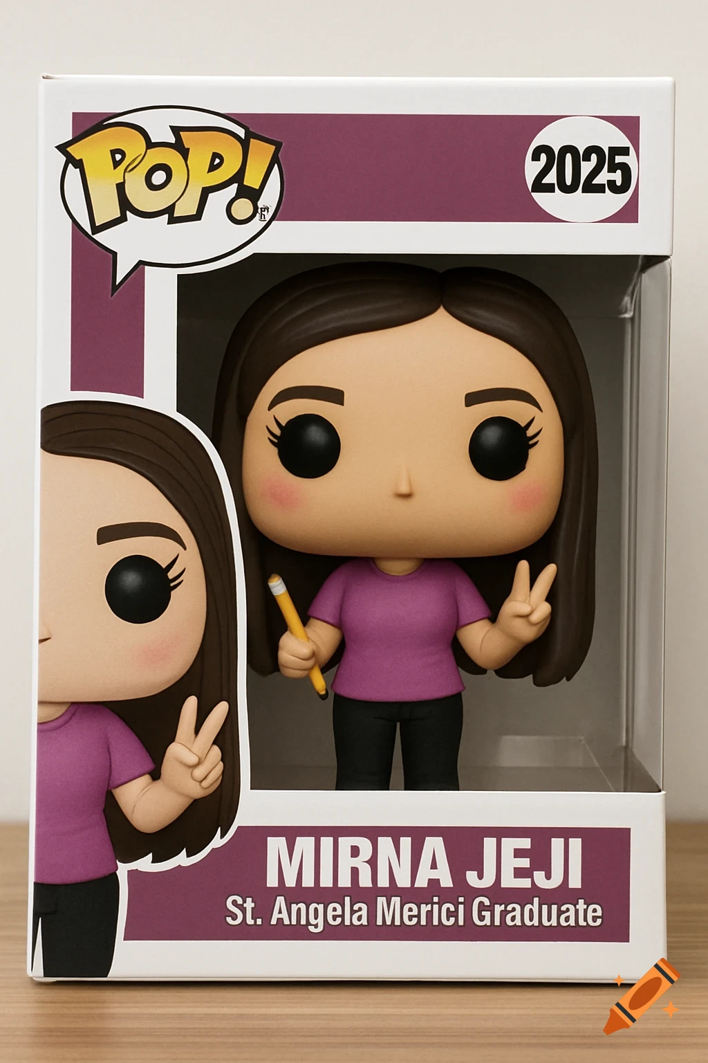 Funko Pop figure of a graduate in a box labeled Mirna Jeji, St. Angela Merici Graduate 2025, holding a pencil and making a peace sign.