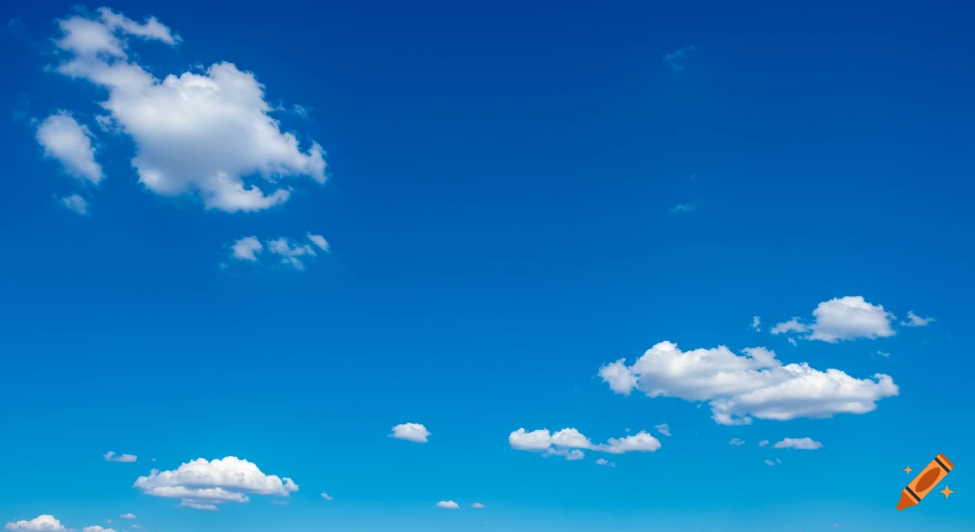 A deep blue sky with scattered white clouds.