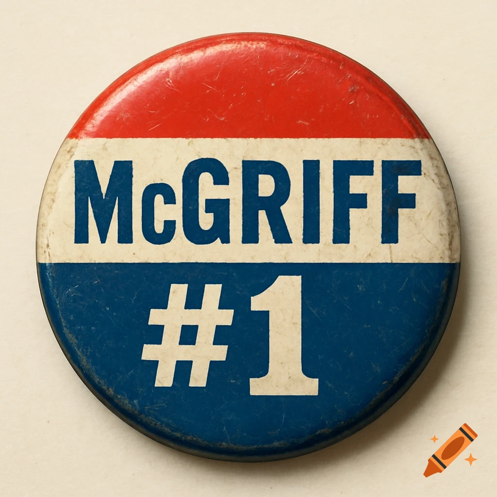 A close-up, top-down shot of a vintage campaign button with a red, white, and blue design, reading "McGRIFF #1" in bold blue and white text.