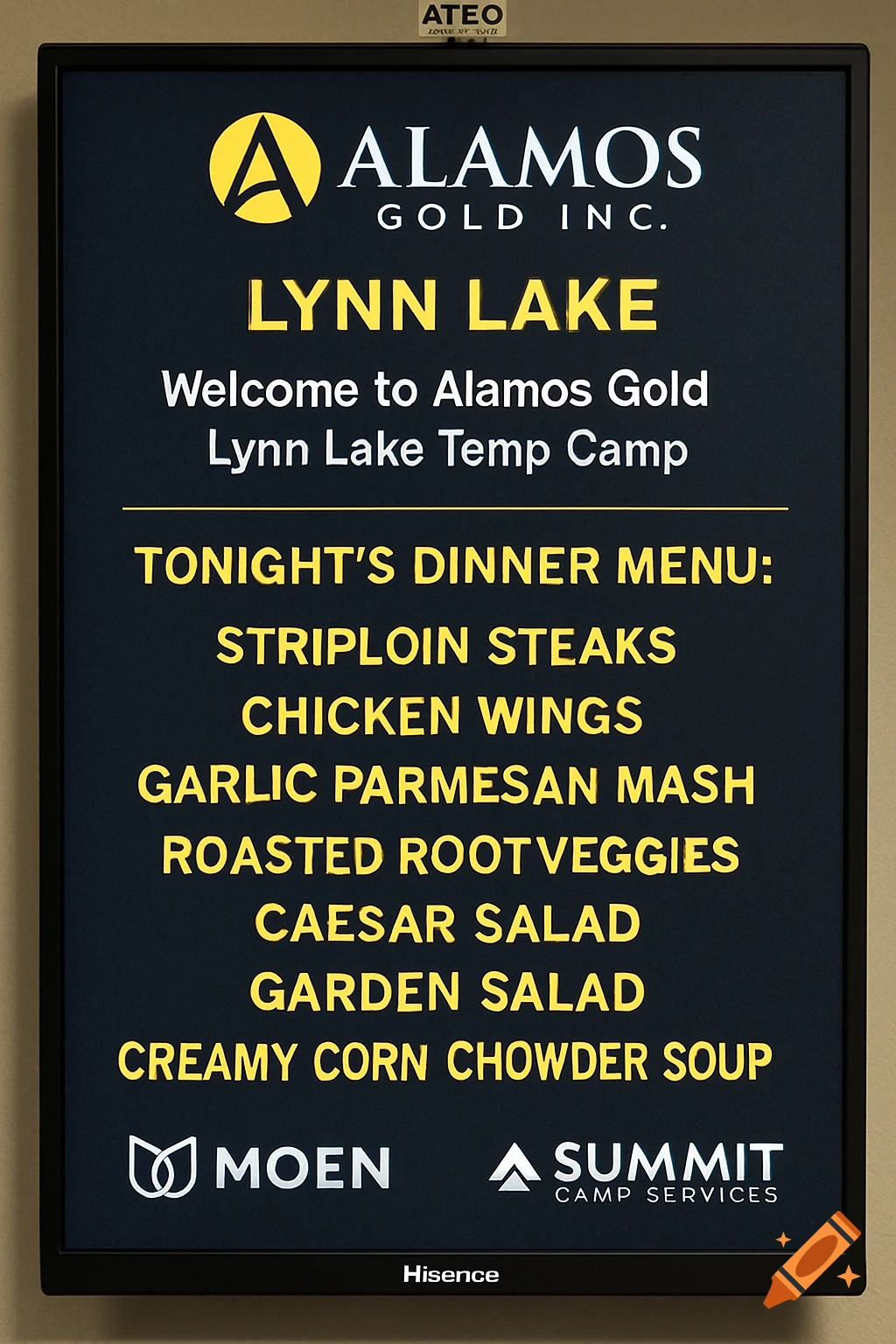 A digital monitor displays a menu for Alamos Gold Inc. Lynn Lake Temp Camp, listing dinner items and company logos.