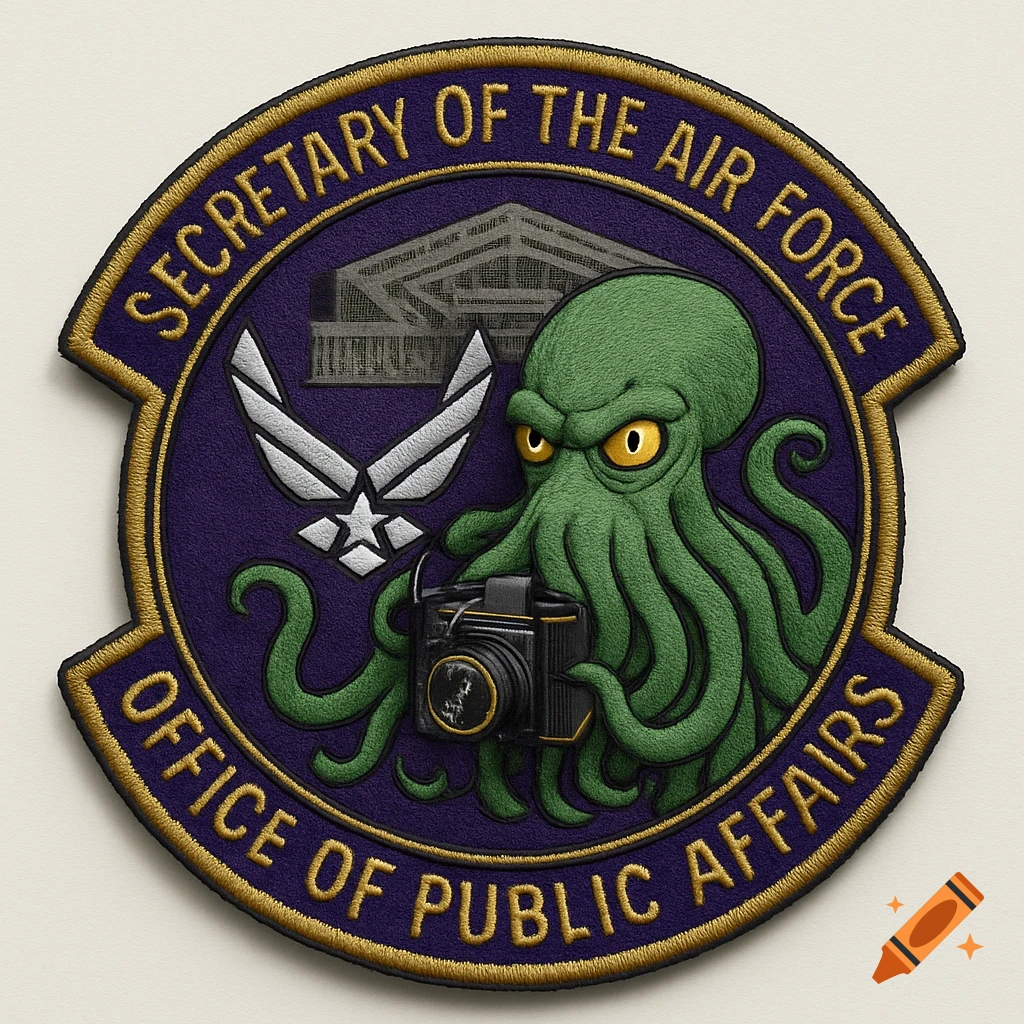 An embroidered purple patch for the 'Secretary of the Air Force Office of Public Affairs', featuring a green Cthulhu holding a camera, the U.S. Air Force logo, and a faint Pentagon building in the background.