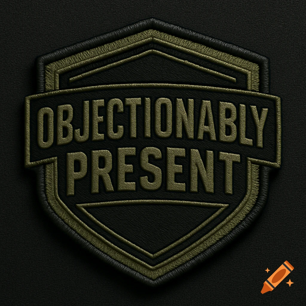 An olive green and black embroidered patch with the text 'OBJECTIONABLY PRESENT' in a shield shape.
