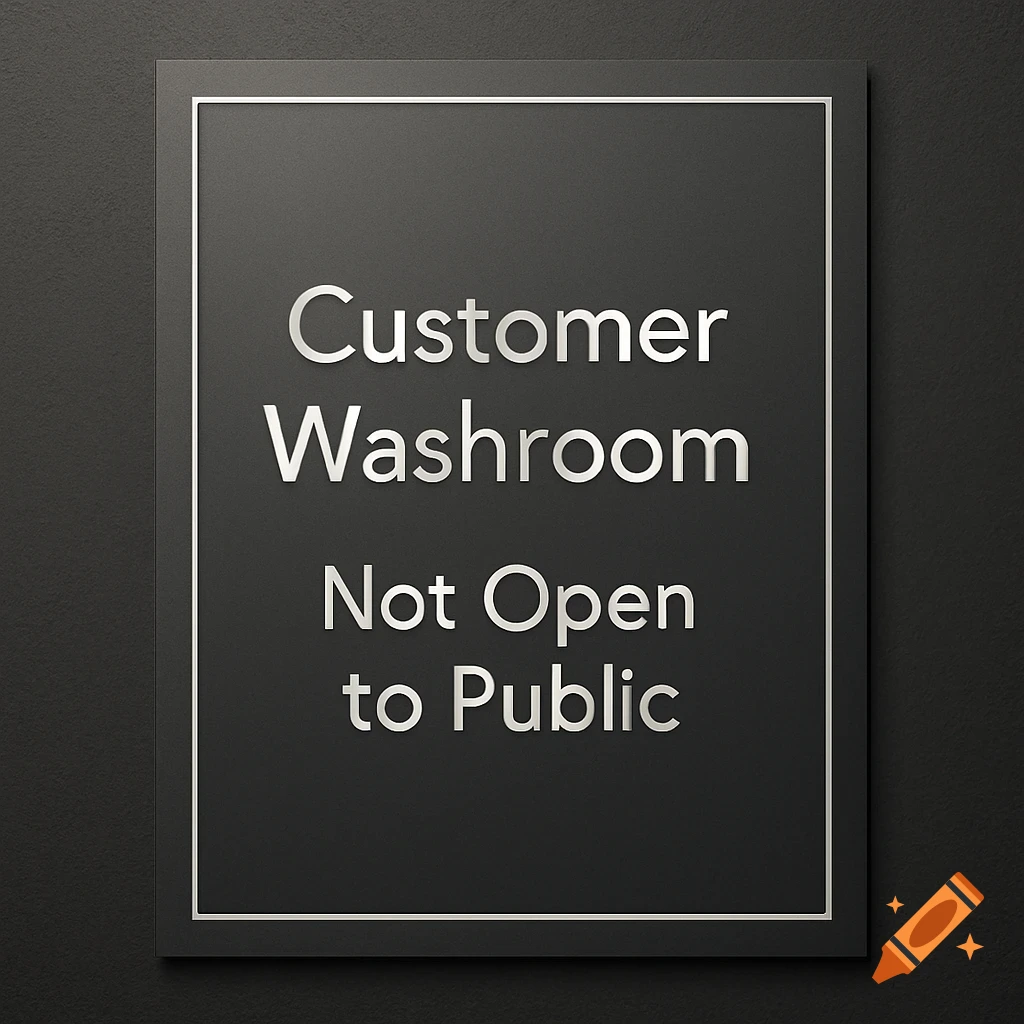 A dark gray sign with white text that reads 'Customer Washroom Not Open to Public'.