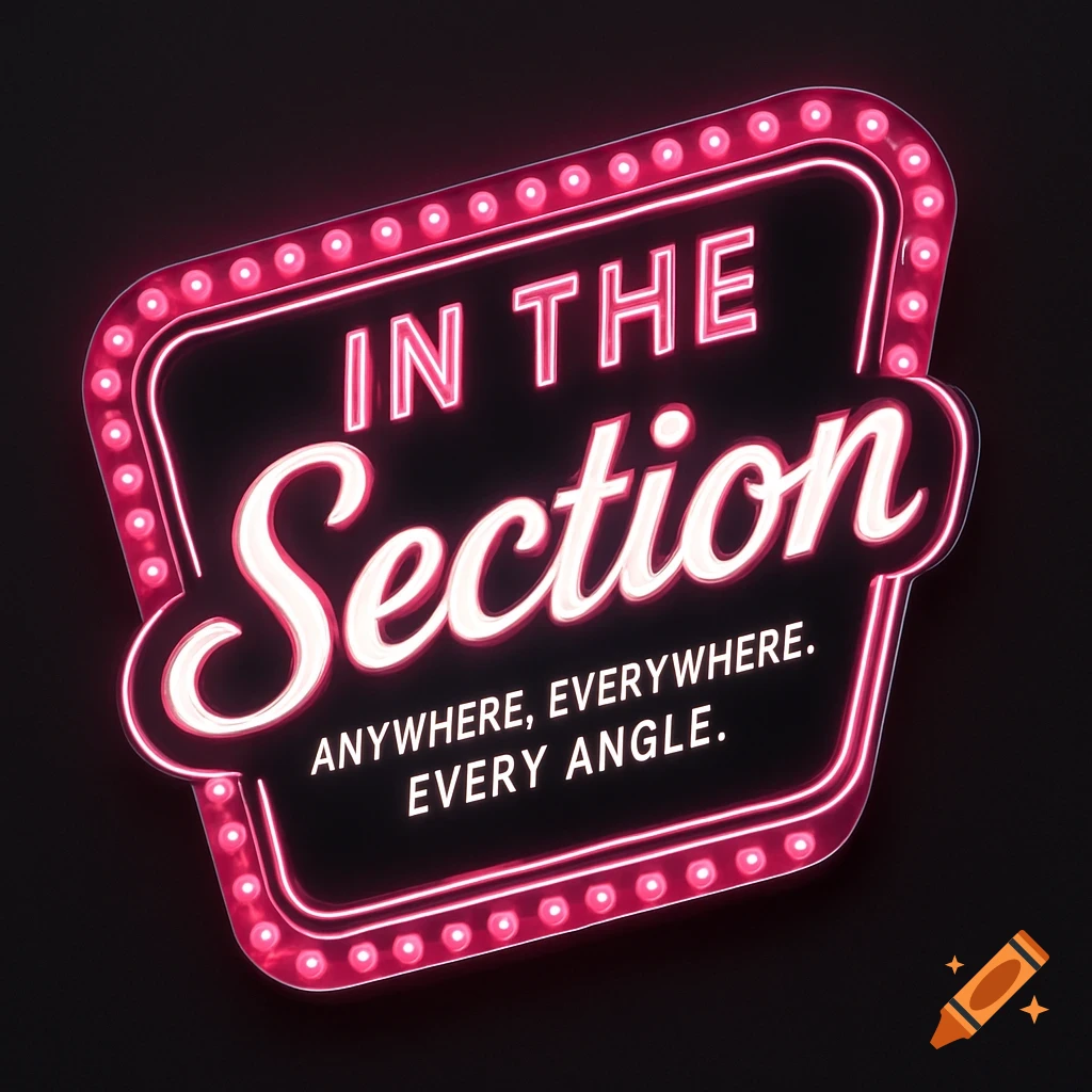 A pink and white neon sign on a black background reads "IN THE Section ANYWHERE, EVERYWHERE. EVERY ANGLE."