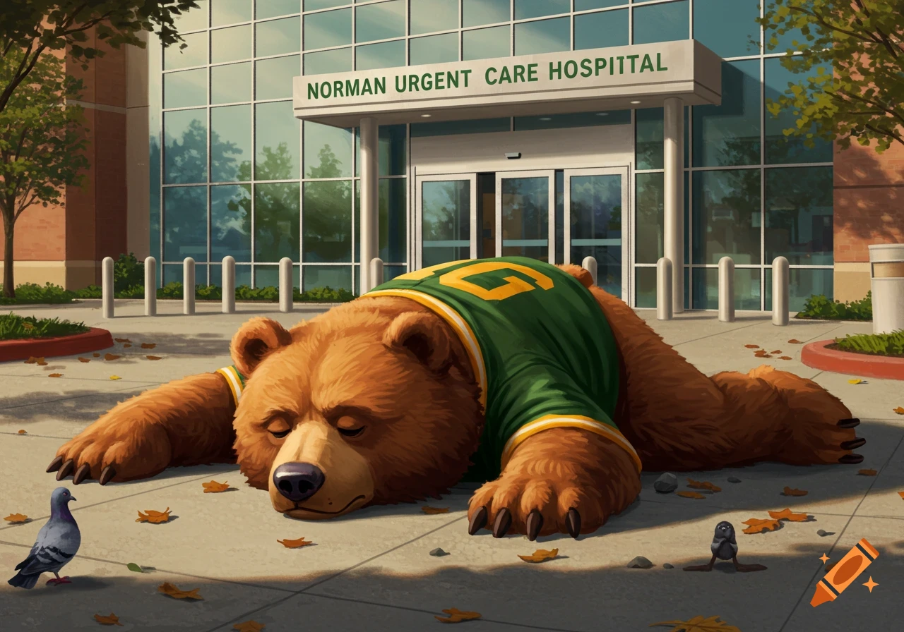 A cartoon brown bear in a green and gold jersey lies on the ground in front of Norman Urgent Care Hospital.
