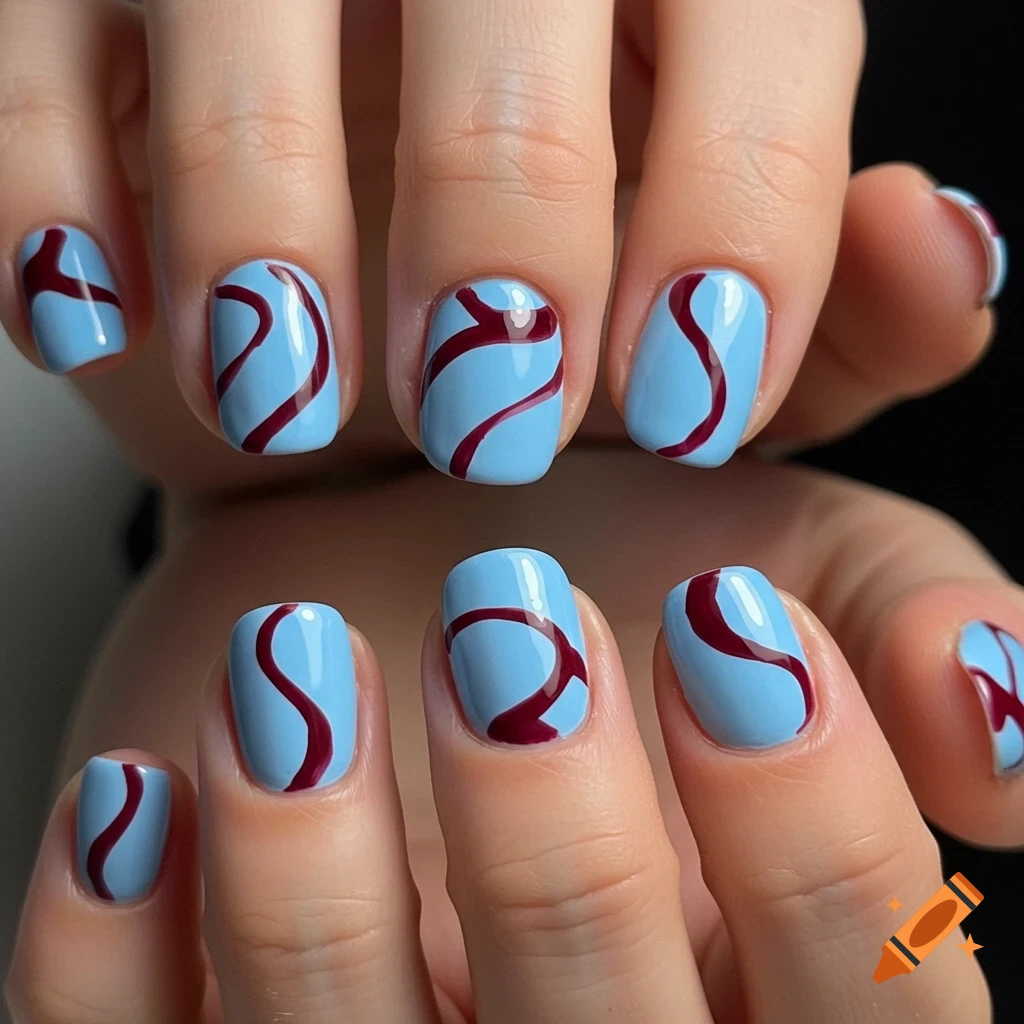 Close-up of hands with short, round nails painted sky blue with abstract crimson wavy lines.