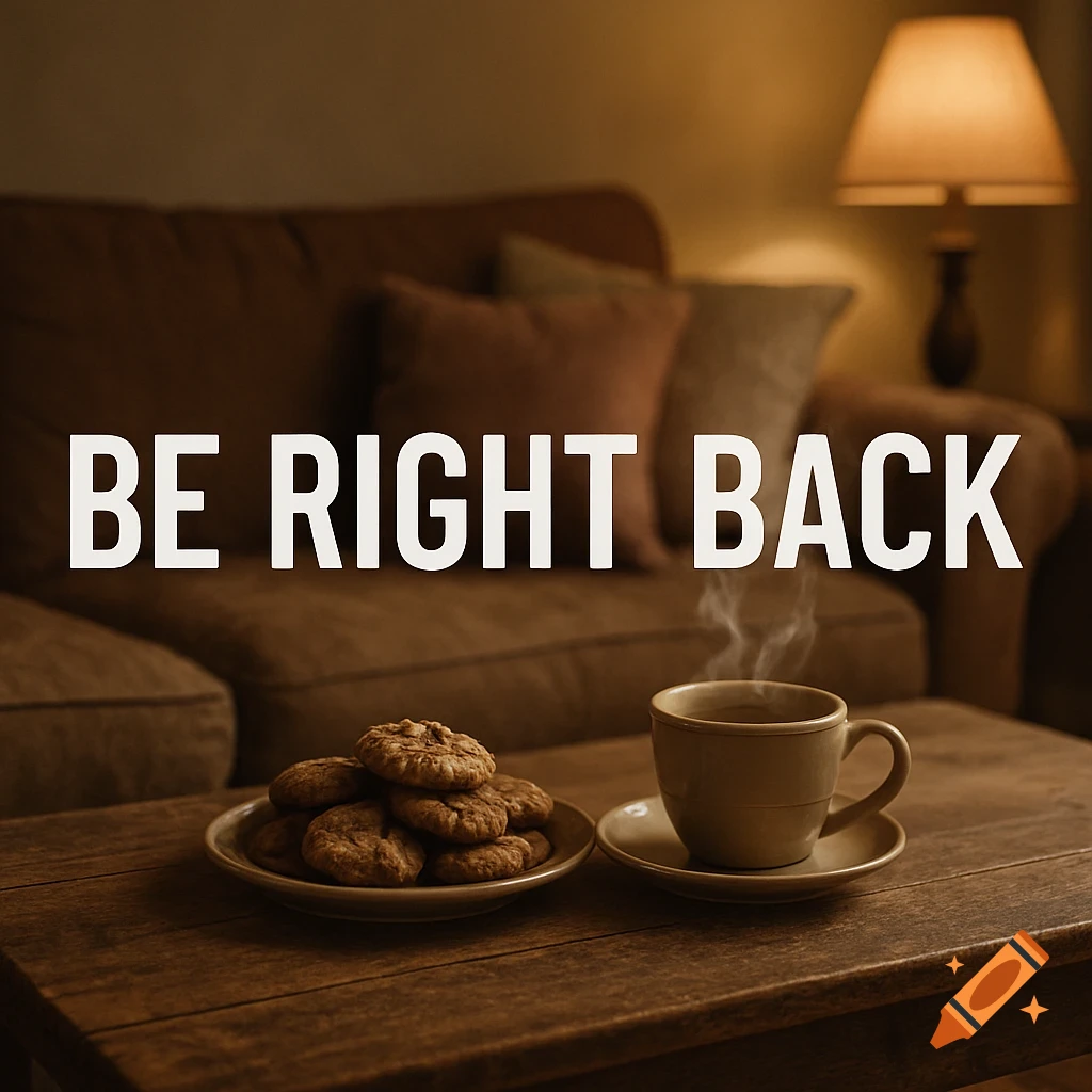 A plate of cookies and a steaming coffee cup on a wooden table in front of a sofa, with 'BE RIGHT BACK' text.