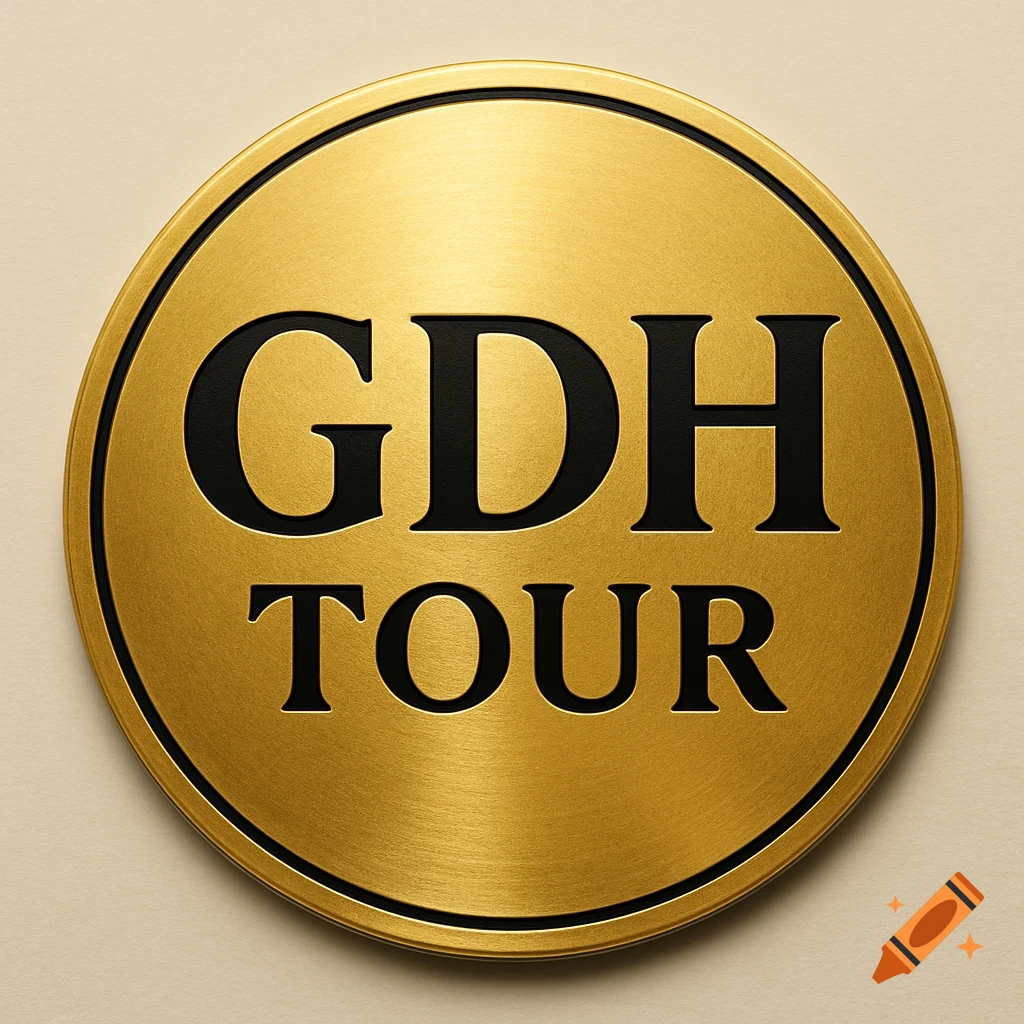 A round, brushed gold logo with the embossed black text 'GDH TOUR' in the center.