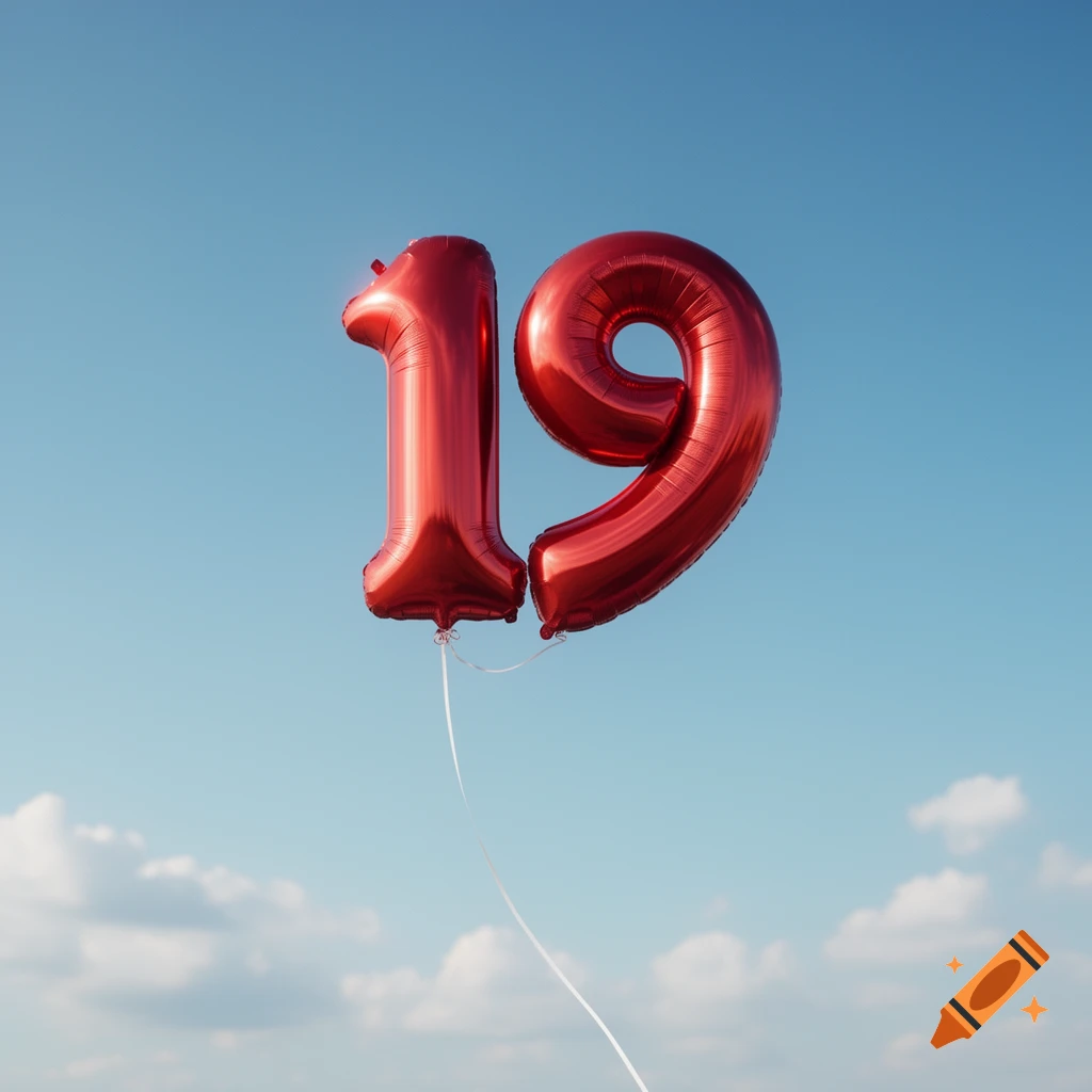 Two shiny red foil balloons shaped as the number 19 float against a clear blue sky with soft white clouds.