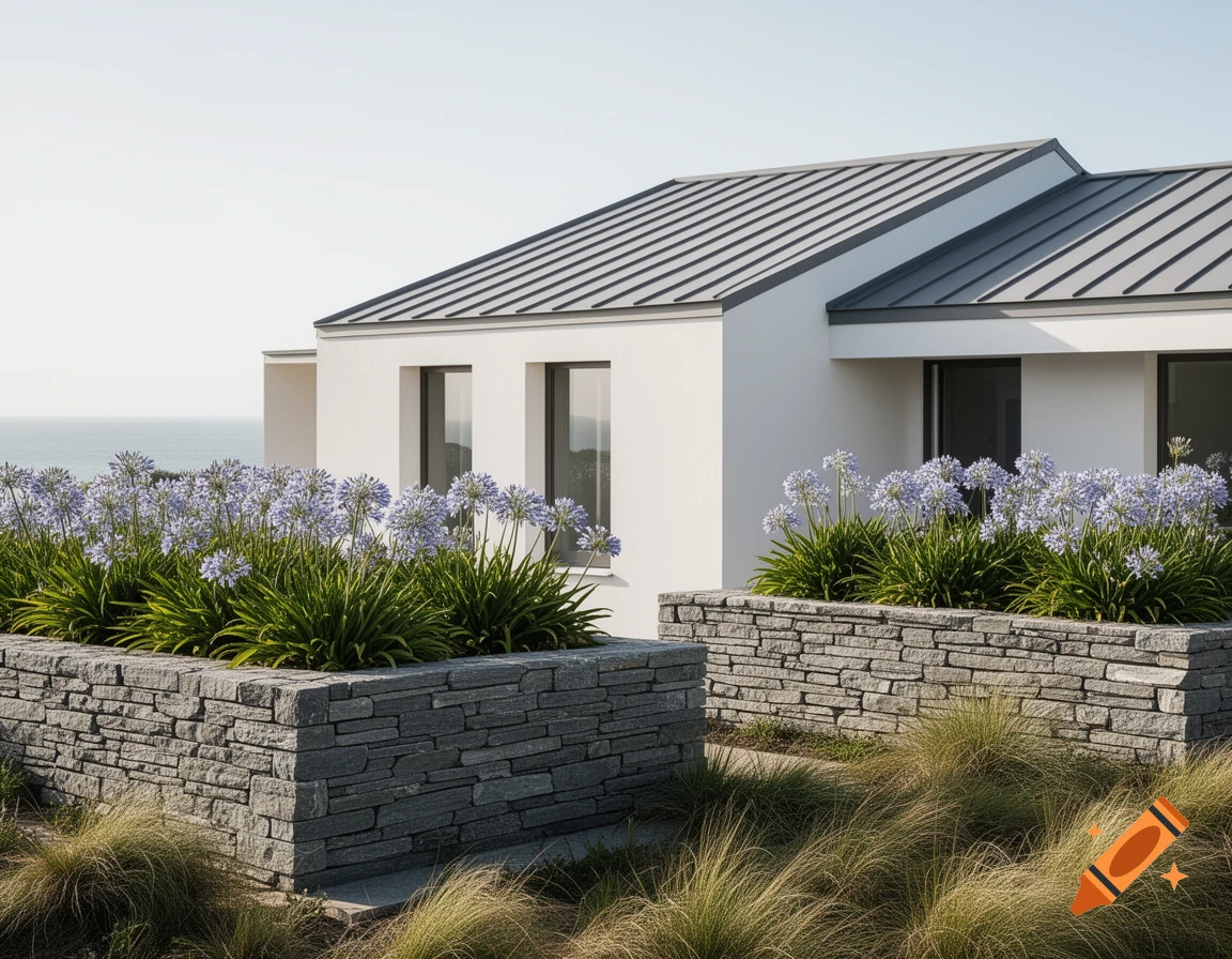 Photorealistic contemporary coastal home with white walls, metal roof, and stone planting beds filled with blue agapanthus and grasses. Ocean in background.