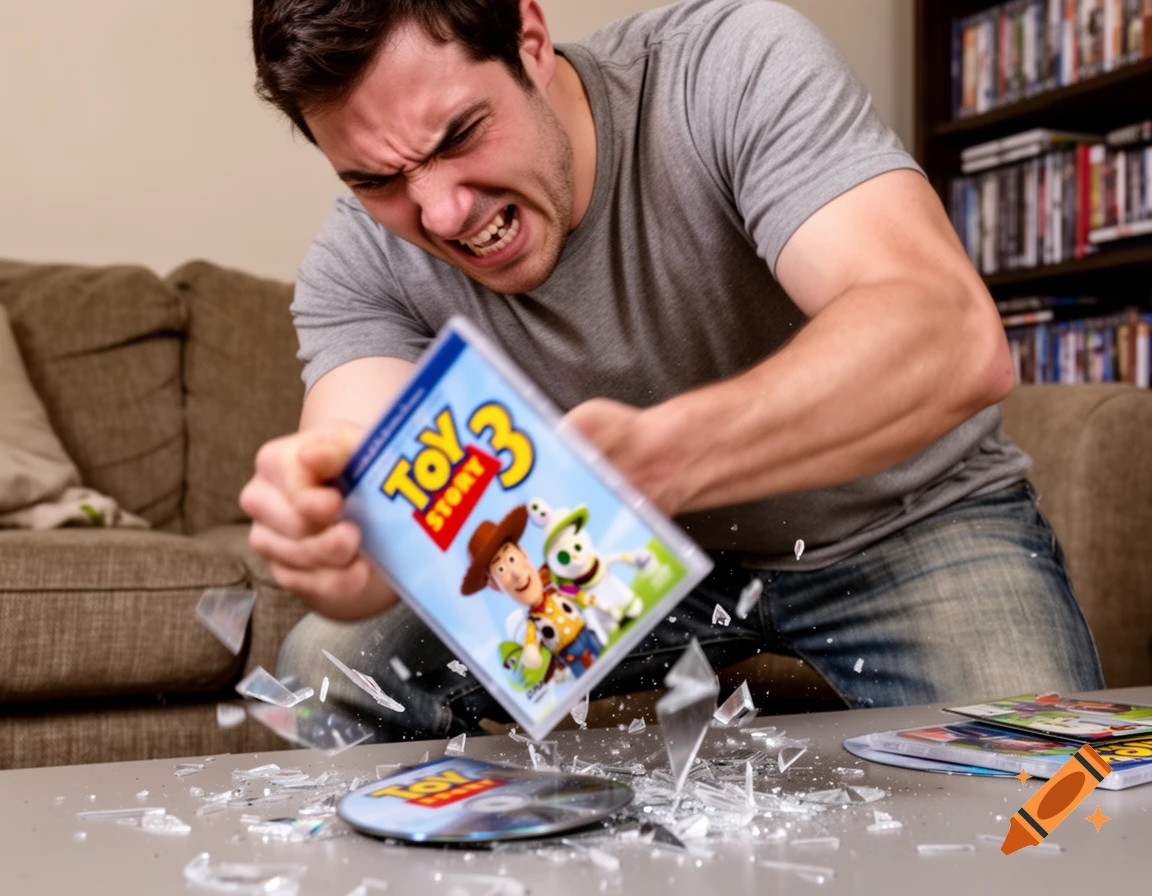 A man with an angry expression smashes a 'Toy Story 3' DVD case and disc, sending shattered pieces flying on a table.