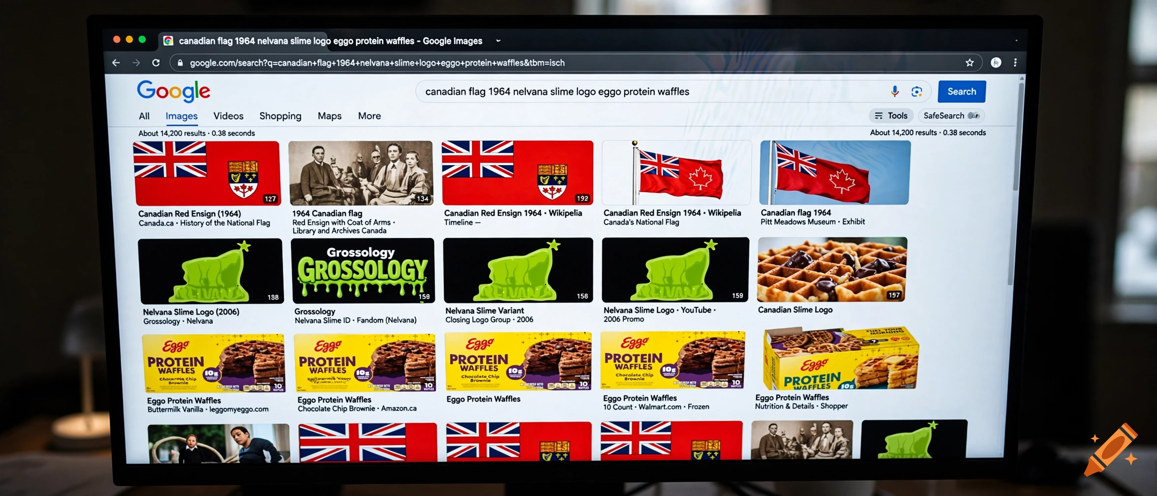 Photograph of a computer monitor displaying a Google image search results page for historical flags and logos.