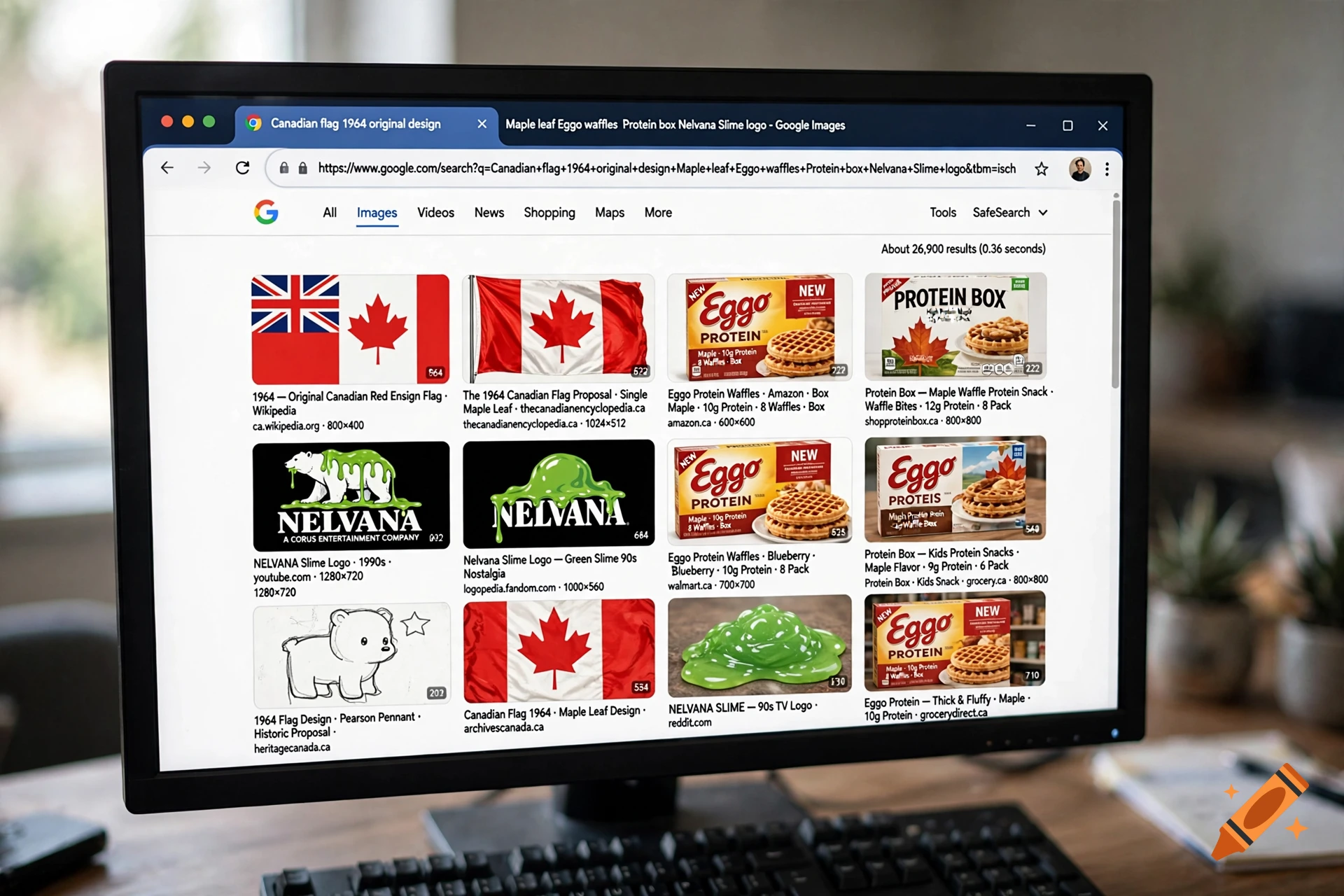 Close-up of a computer monitor displaying a Google image search for Canadian flag designs and Eggo waffles.