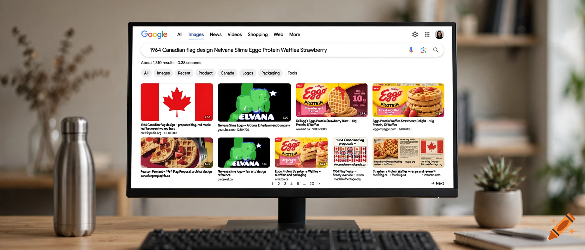 A computer monitor displaying a Google image search results page for Canadian flag designs and Eggo protein waffles, sitting on a wooden desk.