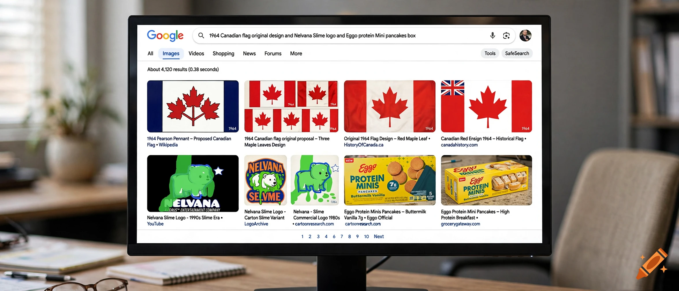A computer monitor on a desk showing a Google search results page for Canadian flags and logos.