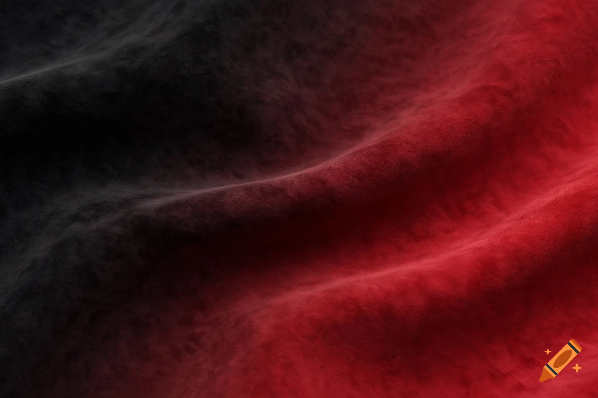 Close-up of black and red textured fabric with soft folds.