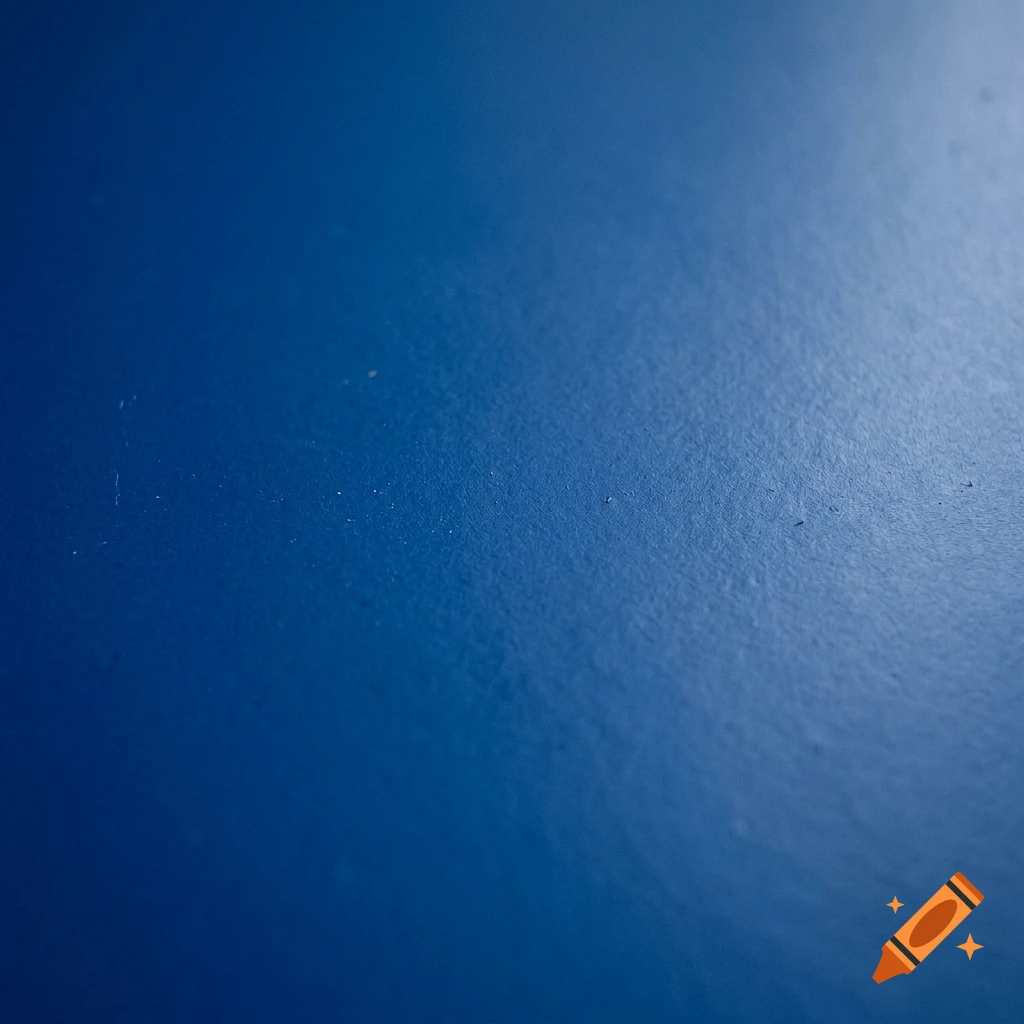 Close-up of a textured solid dark blue surface with soft lighting and subtle gradient.
