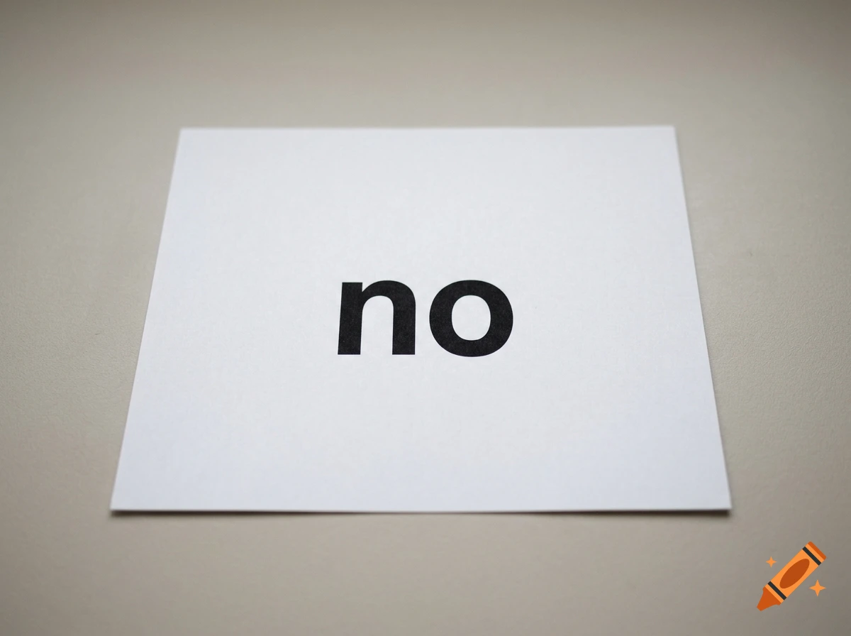 A photograph of a square piece of white paper with the word 'no' printed in black lowercase letters, resting on a neutral surface.